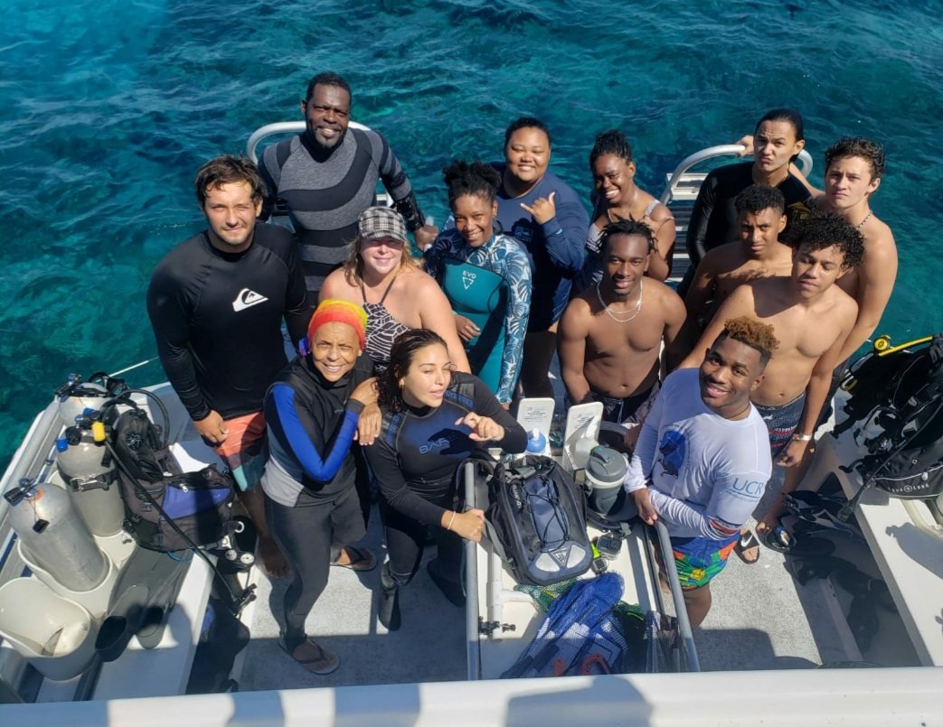Conservation excursion team on a boat